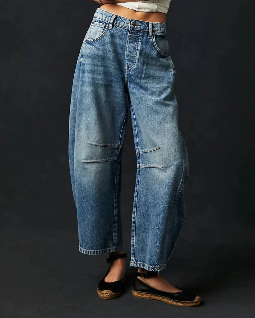 Stylowe damskie jeansy ze średnim stanem – luźny krój zapewniający wygodę i elegancję